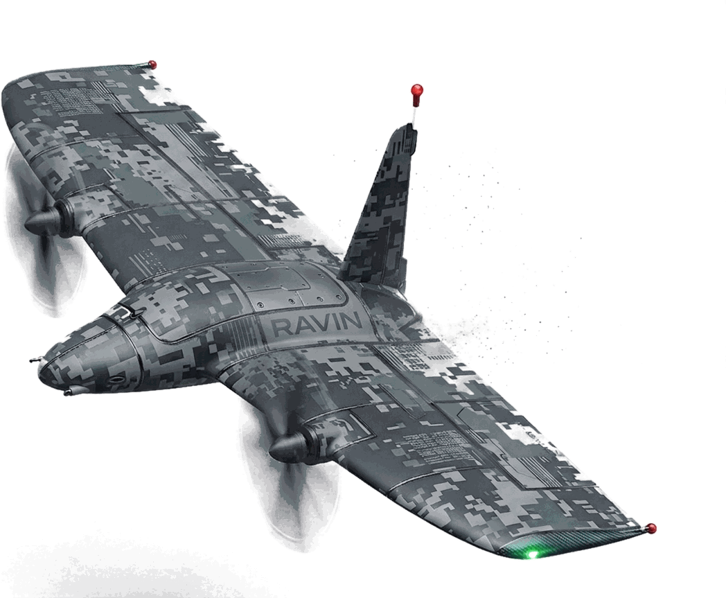 The Ravin VTOL tailsitter in flight in a digital camouflage scheme, both wing propellers turning and wingtip navigation lights lit.
